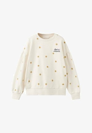 Felpa color crema chiaro con ricamo floreale giallo sparso, collo e polsini a coste, e fascia elastica in vita. Tessuto dalla consistenza morbida.