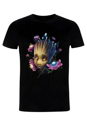 Black t-shirt featuring a colorful illustration of a tree-like character surrounded by pink flowers and blue accents. Soft cotton material.