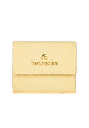 Yellow leather wallet with a textured surface, featuring a gold logo and a flap closure. Compact design suitable for cards and cash.