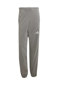Grå træningsbukser lavet af blødt stof med elastisk talje og smalle manchetter. Har et hvidt Adidas-logo på venstre lår.