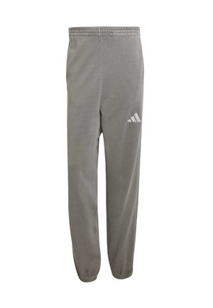 Grå træningsbukser lavet af blødt stof med elastisk talje og smalle manchetter. Har et hvidt Adidas-logo på venstre lår.