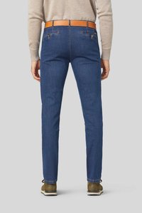 Dark blue denim trousers with a slim fit and a brown leather belt. Features back pockets and stitching details. Textured fabric.