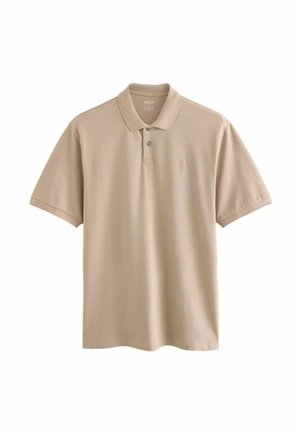Polo beige à manches courtes avec deux boutons et un petit logo brodé sur le côté gauche de la poitrine.