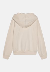 Beige mikina s kapucí na stahovací šňůrku, žebrovanými manžetami a lemem. Vyrobena z měkké tkaniny, s bezešvým designem zad.