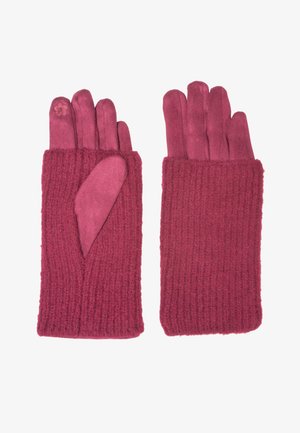 Une paire de gants en tricot et en daim rose, le gant gauche présentant un détail floral sur l'index, les deux gants ayant des poignets en tricot côtelé.