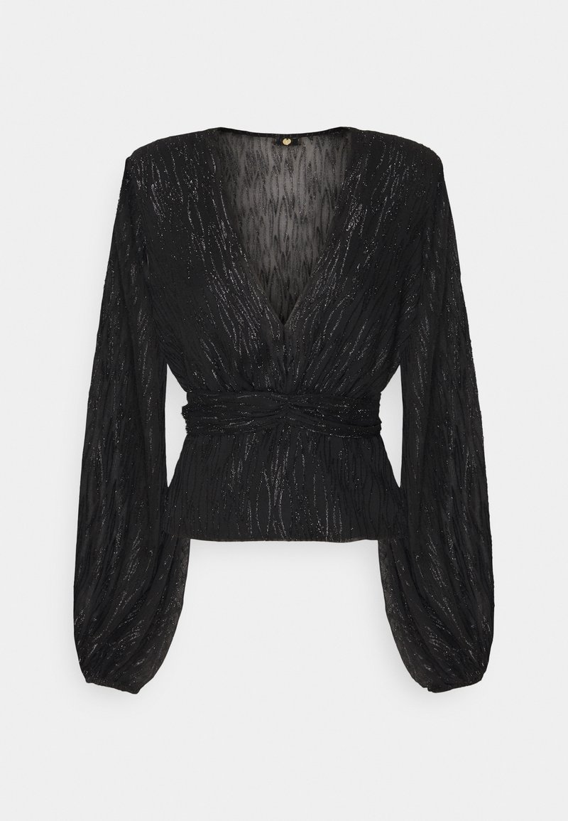 Blouse noire à manches longues avec un col en V profond, taille cintrée et un motif texturé subtilement scintillant, avec des manches légèrement bouffantes.