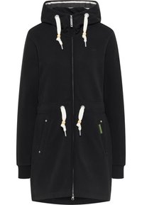 Veste à capuche longue noire avec cordons blancs, perles en bois, fermeture éclair à l'avant et deux poches latérales avec boutons-pression.