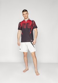 Venum RAPID FIGHTSHORTS - Sport rövidnadrágok - white/black