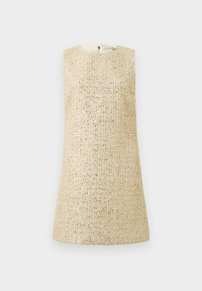 Beige mouwloze jurk gemaakt van textuurstof met glinsterende accenten. Voorzien van een ronde halslijn en een rits aan de achterkant.