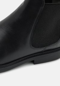 Levi's® AMOS CHELSEA Stiefelette full black/schwarz Zalando