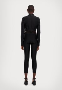 Just Cavalli SKINNY FOUSEUX - Leggingek - Nadrágok - black