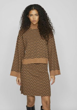 - Sweter