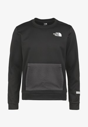 Sudadera negra de manga larga con cuello redondo, bolsillo delantero a cuadros y logotipo blanco de The North Face en el pecho y en la muñeca izquierda.