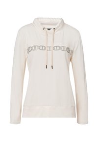 Lichtbeige hoodie met een hoge hals, voorzien van een zilveren kettingpatroon over de borst, verstelbare trekkoorden en een zachte katoenmix textuur.