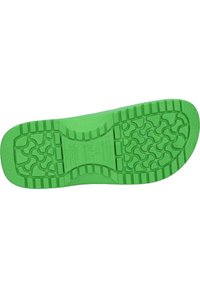 Semelle en caoutchouc verte avec un motif de grip texturé et des accents surélevés, avec le logo visible sur la zone de l'arche. La forme est large et plate.