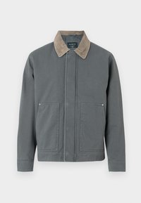 Grijze canvas jack met een corduroy kraag, twee voorzakken en een eenvoudige sluiting aan de voorkant. Heeft een gestructureerd oppervlak en een comfortabele pasvorm.