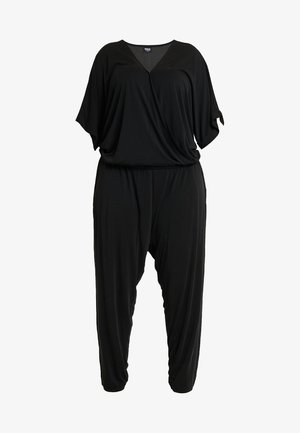 Black jumpsuit made of soft, lightweight fabric. Features a V-neck, loose short sleeves, and a relaxed fit with tapered legs.