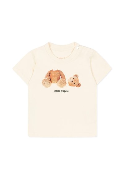 T-shirt bébé couleur crème avec un motif d'ours en peluche séparé et le texte "Palm Angels" en dessous de l'ours à l'avant.