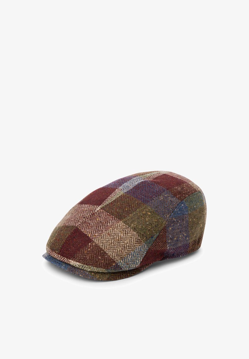 Tweed flat cap featuring a multicolored checkered pattern with hues of brown, red, blue, and green. Soft texture with a curved brim.