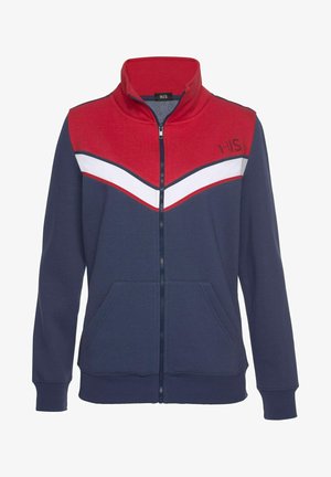 Navy zip-up jacket with red and white chevron stripes on the chest, high collar, two front pockets, and embroidered logo on the chest.