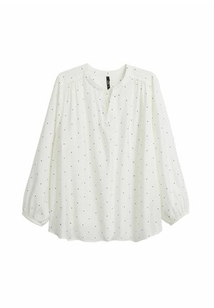 White blouse with a round neckline, three-quarter sleeves, and black polka dots. Soft, lightweight fabric with gathered details at the shoulders.