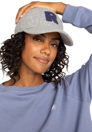 Gray felt cap with a rounded visor, featuring a blue embroidered "R" on the front. The brim is slightly curved, and the fabric has a textured finish.