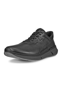 Zwarte sport schoenen met een soepele leren en stoffen bovenwerk, vetersluiting, gevoerde kraag en een textuurzool voor grip. Minimalistisch ontwerp.
