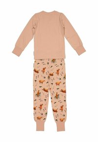 Persikofärgad långärmad topp med matchande byxor som har lekfulla tryck av kor och cyklar, med elastiska muddar på ärmar och ben.