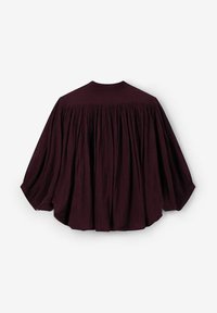 Dark purple long-sleeve blouse with wide, gathered fabric and buttoned cuffs, shown from the back on a white background.