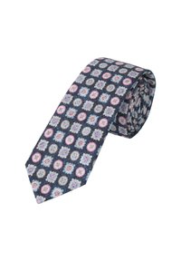 Blue patterned tie featuring circular floral motifs in pink, white, and blue on a dark background, made from a textured fabric.