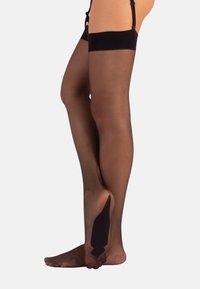 Collant neri alti fino alla coscia con una texture trasparente e una finitura opaca. Presentano una banda nera solida nella parte superiore e un'area della punta rinforzata.