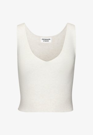 Cream-colored sleeveless top with a v-neckline, made from soft, textured fabric. Features a cropped design and a label with "COPENHAGEN STUDIOS."