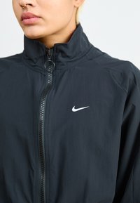 Nike Sportswear STREET - Casaco de treino - black