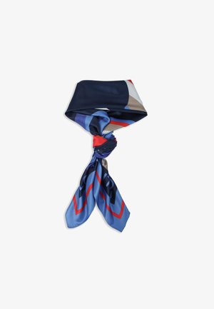 Silk scarf with a geometric pattern in navy blue, light blue, red, and beige; twisted knot at center; smooth texture.
