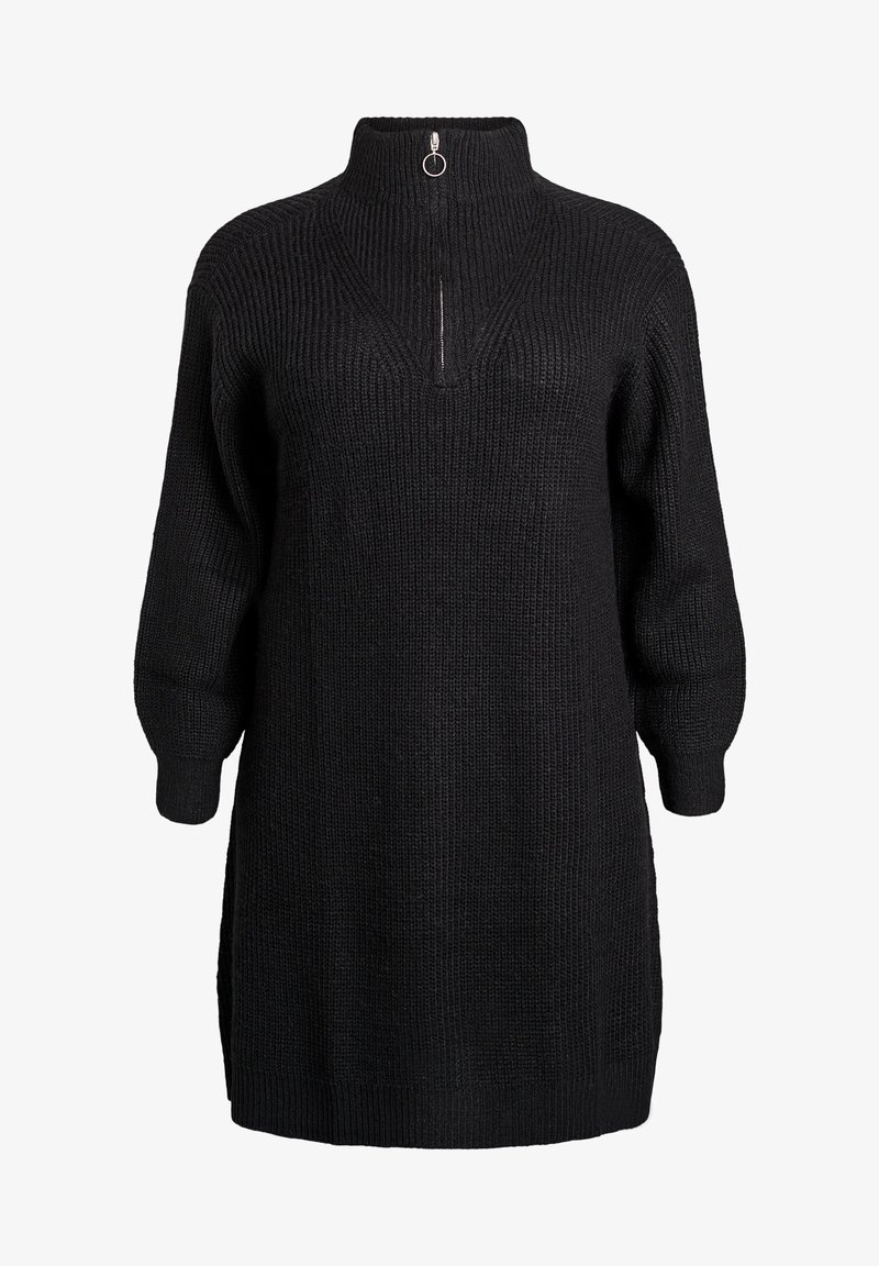 Abito in maglia nera con collo alto, chiusura a zip parziale e maniche a palloncino. Presenta una texture a costine e spaccature laterali all'orlo.