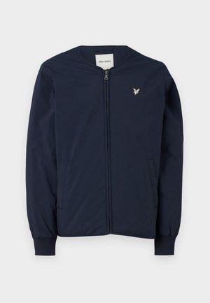 Navy blue bomber jacket with a zip front, ribbed cuffs, and a small embroidered logo on the chest. Smooth, lightweight fabric. Two side pockets.
