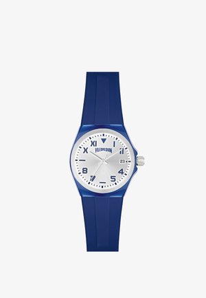 Reloj de silicona azul con esfera plateada, marcadores de hora en negrita y ventana de fecha. Presenta una caja redonda y un diseño de correa paralela.