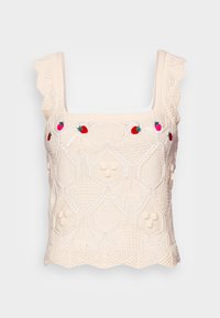 Pletený krémový top se čtvercovým výstřihem, vlnitými okraji a vyšívanými jahodami. Obsahuje texturované hexagonální vzory.