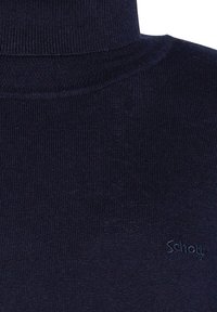 Dunkelblauer Rollkragenpullover mit geripptem Textur. Verfügt über ein kleines, tonal abgestimmtes Logo auf der unteren rechten Seite. Weiches, warmes Strickmaterial.