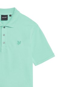 Polo en verde menta hecho de algodón, con una tapeta de tres botones, mangas cortas y un pequeño logo bordado en el pecho.