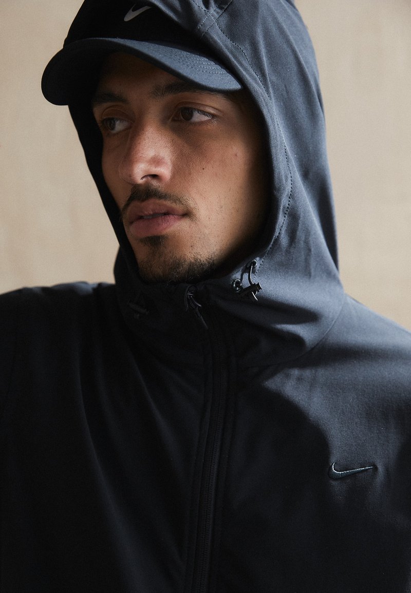 Nike Performance - UNLIMITED - Softshell-jope - black, Suurenda