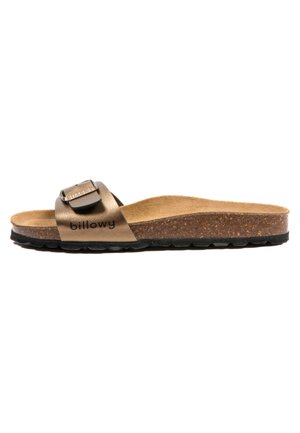 Sandale en cuir marron avec une seule sangle ajustable, semelle en liège et semelle extérieure en caoutchouc noir, arborant une marque "billowy" sur la sangle.