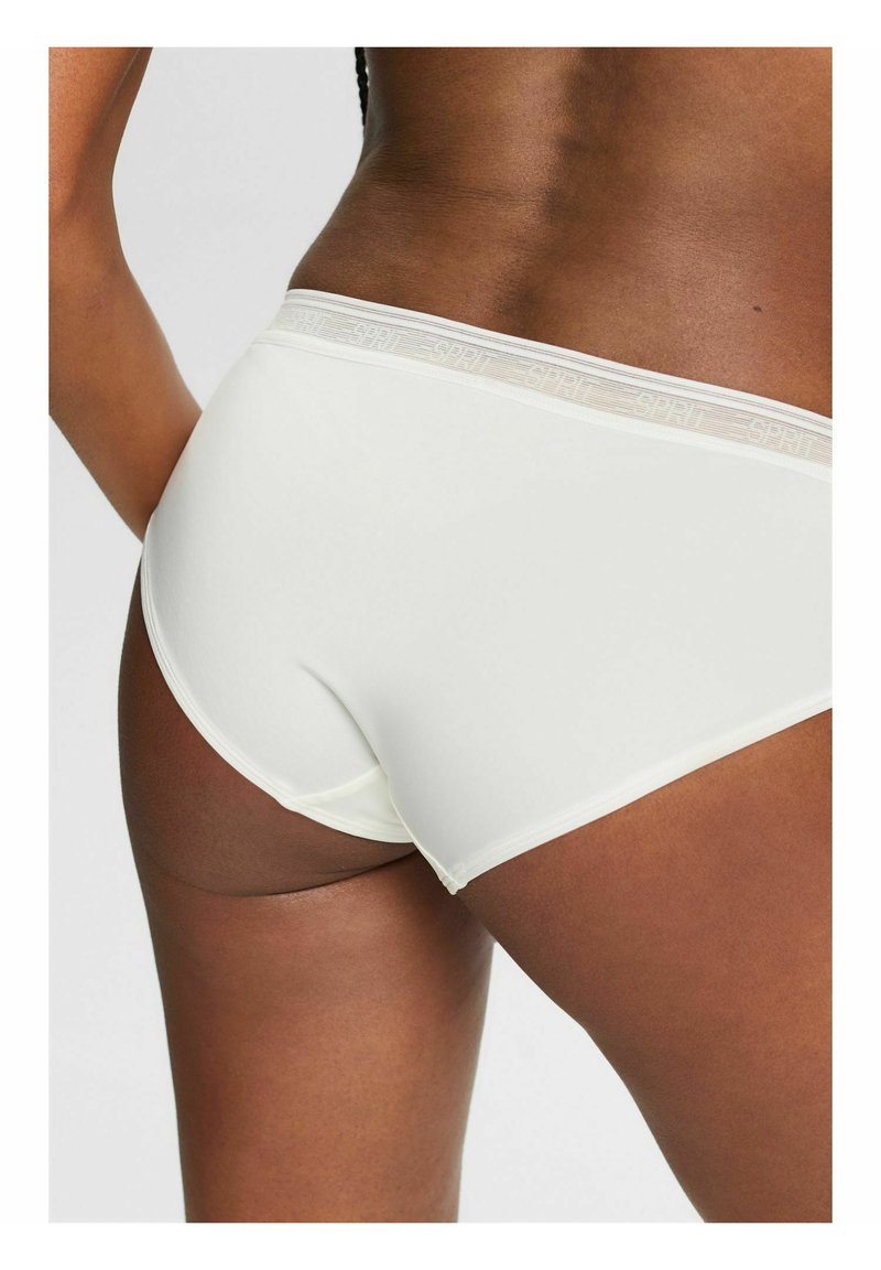 Weiße Baumwollmischung Bikiniunterwäsche mit einem weichen elastischen Bund, der das "SPRT"-Logo trägt. Glatte Textur und figurschmeichelndes Design.
