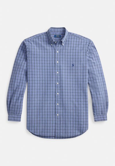 Srajca z dolgimi rokavi in gumbi v modrem karo vzorcu, z ovratnikom, manšetami in majhnim izvezenim logotipom na prsih. Tkanina je primerna za pranje v pralnem stroju.