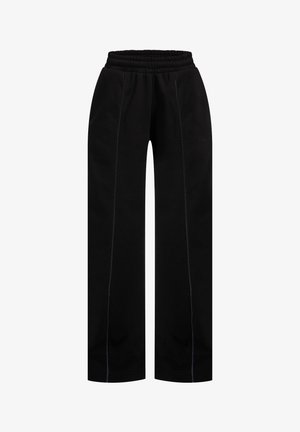 Pantaloni della tuta neri con vestibilità rilassata, dotati di una vita elasticizzata, cuciture laterali e cuciture a contrasto per un tocco di dettaglio in più.