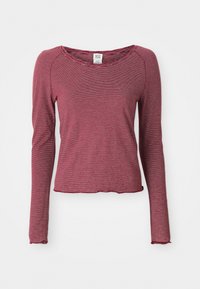 Red and white striped long-sleeve top with a round neckline and a fitted design, featuring a cropped hem and smooth fabric texture.