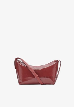 Red patent leather handbag with a curved shape, adjustable strap, and logo embossed on the front, featuring a smooth, glossy texture.