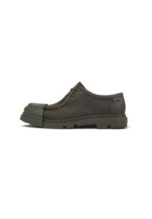 Brown leather shoe with a rubber toe cap and thick sole. Features stitching details and a lace-up design for secure fitting.