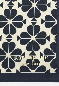 Navy and white scarf featuring a geometric pattern of hearts and diamonds, with a gold "kate spade NEW YORK" logo. Smooth texture.