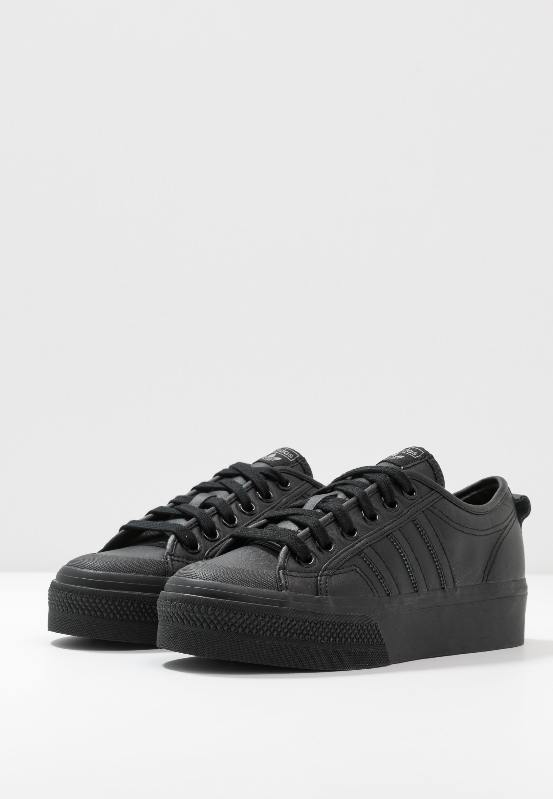 black adidas nizza trainers
